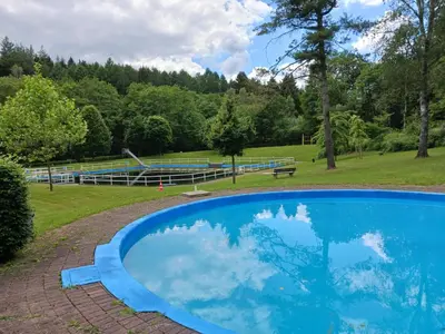 Der Swimmingpool an oder in der Nähe von Ferienwohnung Susanna