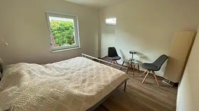 Ein Bett oder Betten in einem Zimmer der Unterkunft Ferienwohnung Bähr