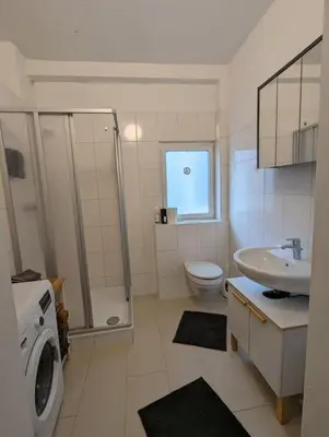 Ein Badezimmer in der Unterkunft Schönes Apartment Mitten in der Stadt 4