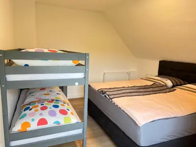Ein Bett oder Betten in einem Zimmer der Unterkunft Haus Hanni