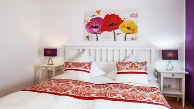 Ein Bett oder Betten in einem Zimmer der Unterkunft Ferienwohnung Seeblick I