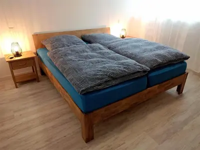 Ein Bett oder Betten in einem Zimmer der Unterkunft Ferienhaus Egger