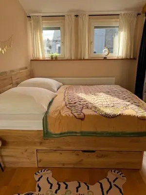 Ein Bett oder Betten in einem Zimmer der Unterkunft Residenz zu Caub - Pfalzgrafenstein Appartment