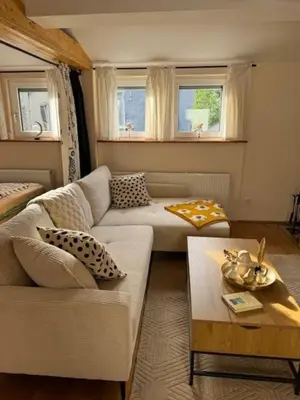 Ein Sitzbereich in der Unterkunft Residenz zu Caub - Pfalzgrafenstein Appartment