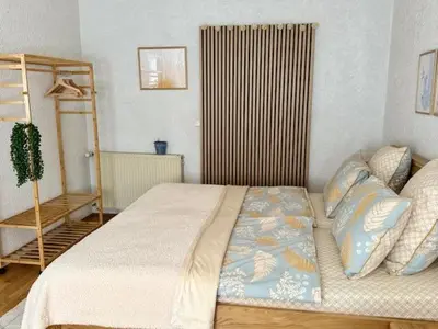 Ein Bett oder Betten in einem Zimmer der Unterkunft Residenz zu Caub - Rheinblick