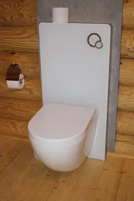 Ein Badezimmer in der Unterkunft Blockhaus eighteen