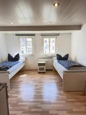 Ein Bett oder Betten in einem Zimmer der Unterkunft Apartment am Markt