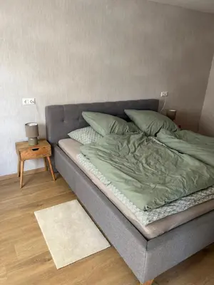 Ein Bett oder Betten in einem Zimmer der Unterkunft Rheintraum Soutterain Wohnung mit Sauna