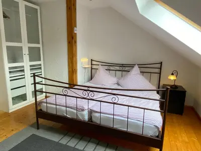 Ein Bett oder Betten in einem Zimmer der Unterkunft Ferienwohnung Stähbachtal