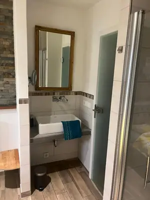 Ein Badezimmer in der Unterkunft Ankerpunkt