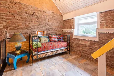 Ein Bett oder Betten in einem Zimmer der Unterkunft Die Alte Metzgerei