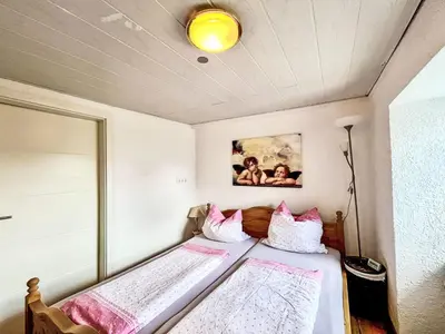 Ein Bett oder Betten in einem Zimmer der Unterkunft Apartment Holiday Home am Bostalsee-2 by Interhome