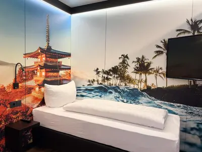 Ein Bett oder Betten in einem Zimmer der Unterkunft MYK Hotel by WMM Hotels