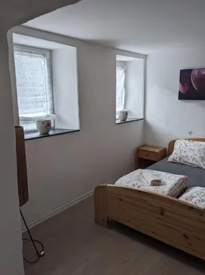 Ein Bett oder Betten in einem Zimmer der Unterkunft 4 persons wohnung in de Eifel