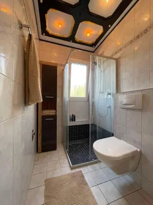 Ein Badezimmer in der Unterkunft Gemütliche Ferienwohnung in Nickenich für 5 Gäste