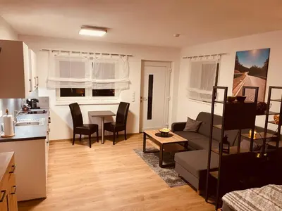 Ein Sitzbereich in der Unterkunft Ferienwohnung in der Hardt