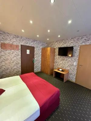 Ein Bett oder Betten in einem Zimmer der Unterkunft Hotel Holl Beyra