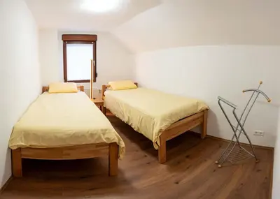 Ein Bett oder Betten in einem Zimmer der Unterkunft Fewo Thielke Fewo 4 Kleiner Moselwinzer
