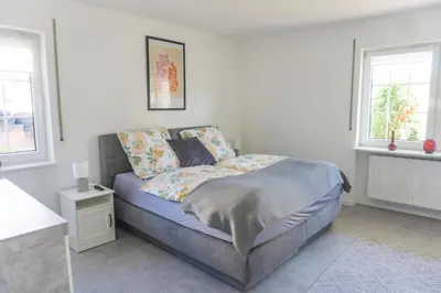 Ein Bett oder Betten in einem Zimmer der Unterkunft Ferienwohnung Leni