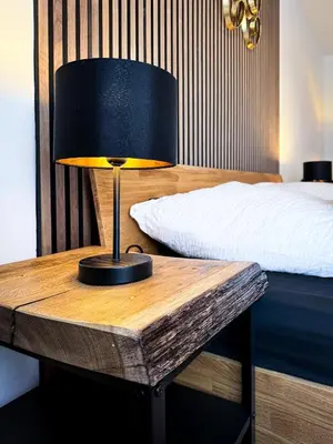 Ein Bett oder Betten in einem Zimmer der Unterkunft King Clusion
