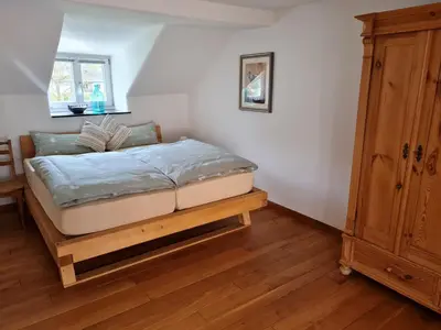 Ein Bett oder Betten in einem Zimmer der Unterkunft Ferienhaus Klein Venedig