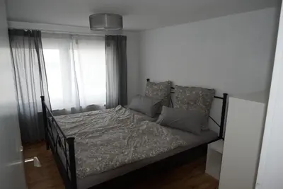Ein Bett oder Betten in einem Zimmer der Unterkunft Ferienwohnung Frieda
