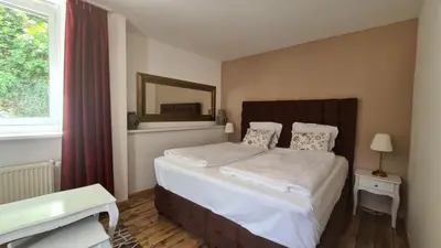 Ein Bett oder Betten in einem Zimmer der Unterkunft Hotel Osteria Del Vino Cochem