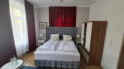 Ein Bett oder Betten in einem Zimmer der Unterkunft Hotel Osteria Del Vino Cochem