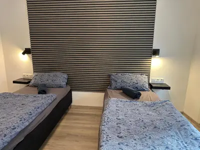 Ein Bett oder Betten in einem Zimmer der Unterkunft Rhaunen Apartments