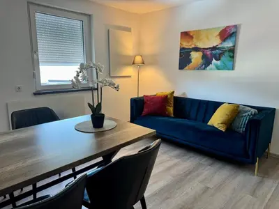 Ein Sitzbereich in der Unterkunft Rhaunen Apartments