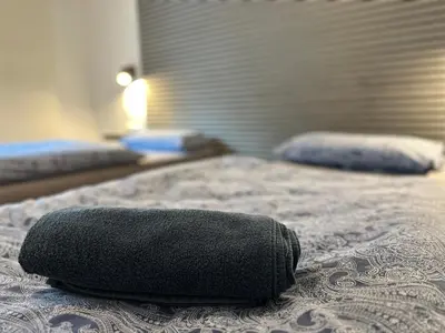 Ein Bett oder Betten in einem Zimmer der Unterkunft Rhaunen Apartments