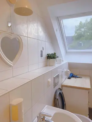 Ein Badezimmer in der Unterkunft OTTOC Ferienwohnung