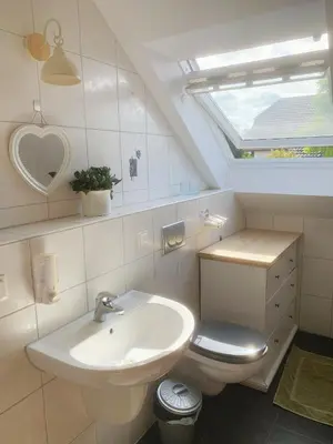 Ein Badezimmer in der Unterkunft OTTOC Ferienwohnung