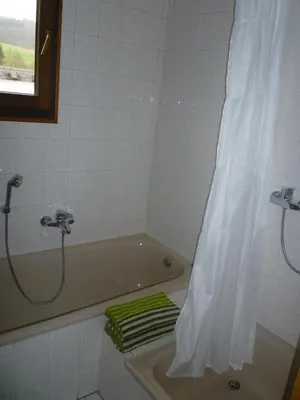 Ein Badezimmer in der Unterkunft Jüttis