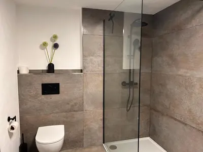 Ein Badezimmer in der Unterkunft Ferienhaus Hohenleimbach