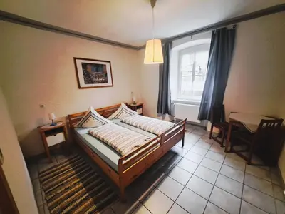 Ein Bett oder Betten in einem Zimmer der Unterkunft Ferienwohnung Jüngling