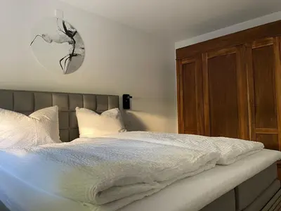 Ein Bett oder Betten in einem Zimmer der Unterkunft Panoramaapartment Wine & Castle