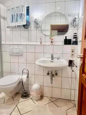 Ein Badezimmer in der Unterkunft Ferienwohnung Theisen