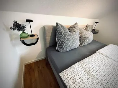 Ein Bett oder Betten in einem Zimmer der Unterkunft Ruhiges Lay-Haus in der Vulkaneifel, bis zu 7 Personen mit Terrasse, Garten und Kamin