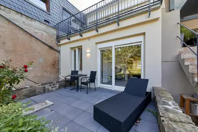 Ein Balkon oder eine Terrasse in der Unterkunft Haus am Moselufer - EG Apartment