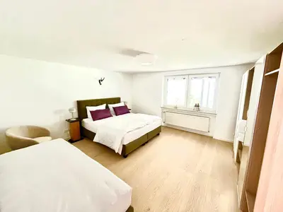 Ein Bett oder Betten in einem Zimmer der Unterkunft Wildblick