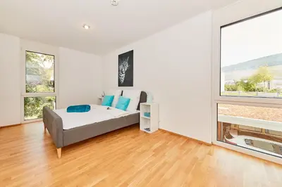 Ein Bett oder Betten in einem Zimmer der Unterkunft Traumblick 1OG