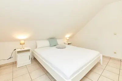 Ein Bett oder Betten in einem Zimmer der Unterkunft Moselschleife 2 0