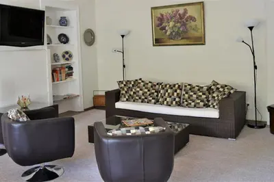 Ein Sitzbereich in der Unterkunft Ferienwohnungen am Stadtpalais Haus Weinberg
