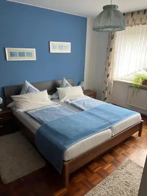 Ein Bett oder Betten in einem Zimmer der Unterkunft Gästehaus Elisabeth Bach