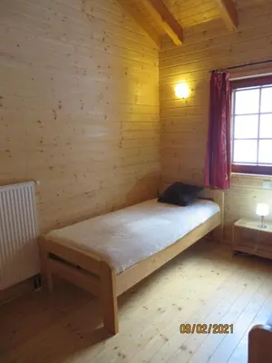 Ein Bett oder Betten in einem Zimmer der Unterkunft Ferienhaus Maja