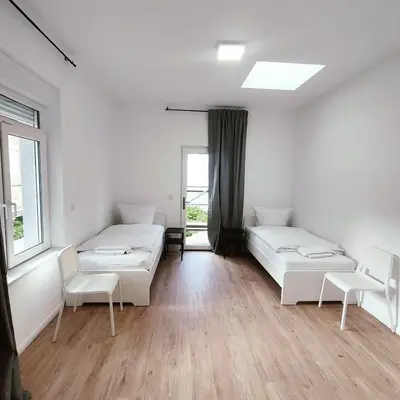 Ein Bett oder Betten in einem Zimmer der Unterkunft DQ04 - Kleines Apartment - 2 Person