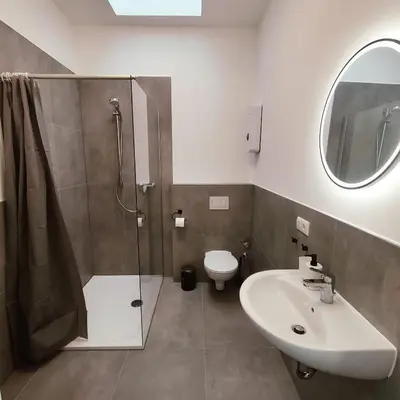 Ein Badezimmer in der Unterkunft DQ04 - Kleines Apartment - 2 Person