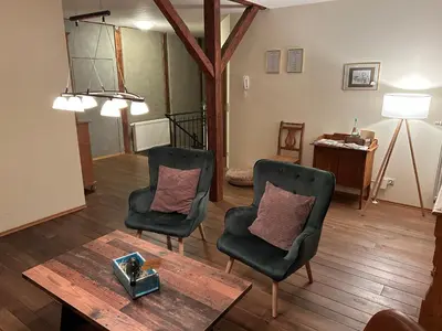 Ein Sitzbereich in der Unterkunft Ferienhaus Ausonius
