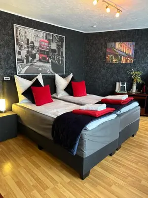 Ein Bett oder Betten in einem Zimmer der Unterkunft Max & Moritz 1 Koblenz
